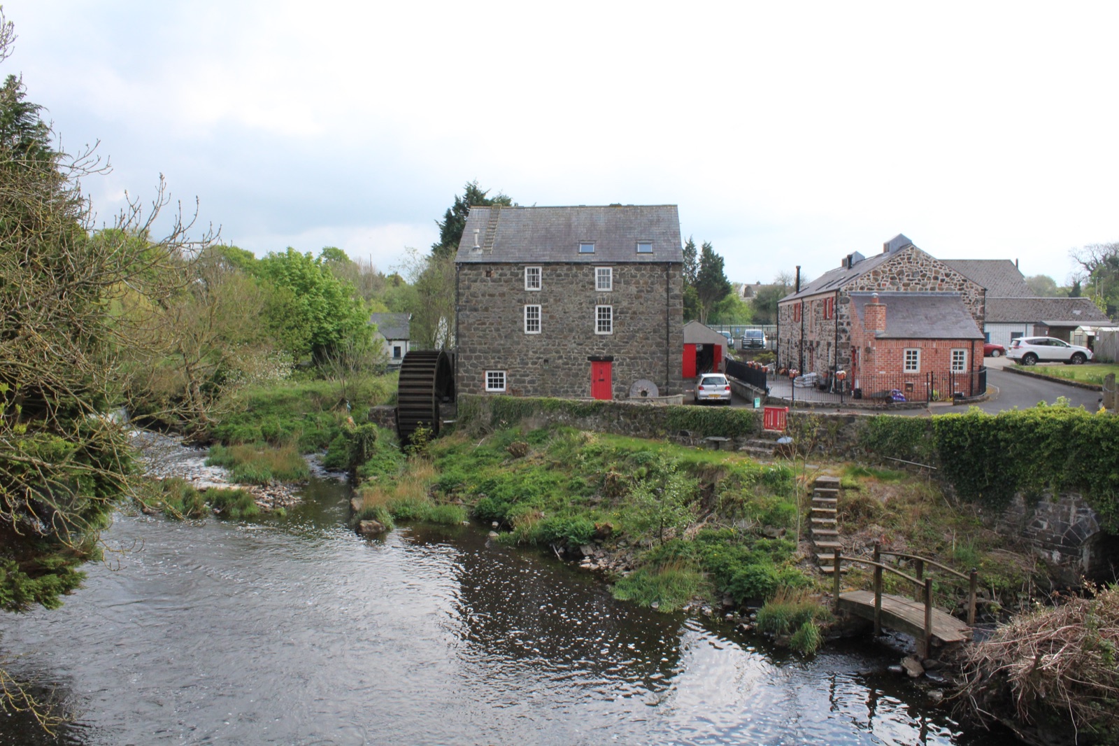 Bonner Mill on the River Bush in Bushmills, a restored stone corn mill with its water wheel visible