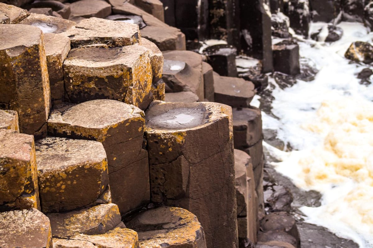 Close-up of the interlocking hexagonal basalt columns of the Giant’s Causeway